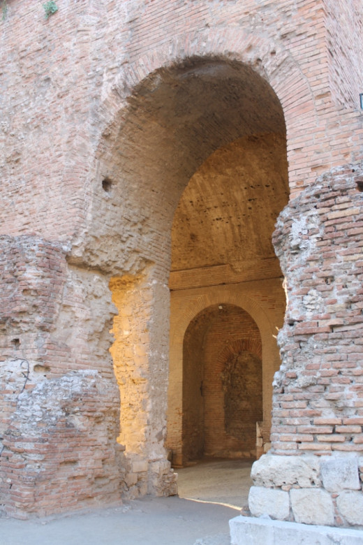 Afternoon sun lights up the stonework at the entry to the amphitheatre.