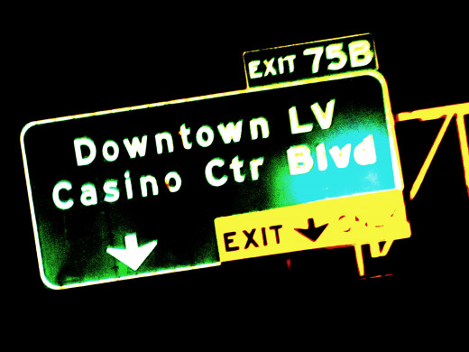 This is the sign for the exit that leads to good old Fremont St.  The highway 95 is a little bumpy at this point making it hard to get a clear shot. Adds character don't ya think?