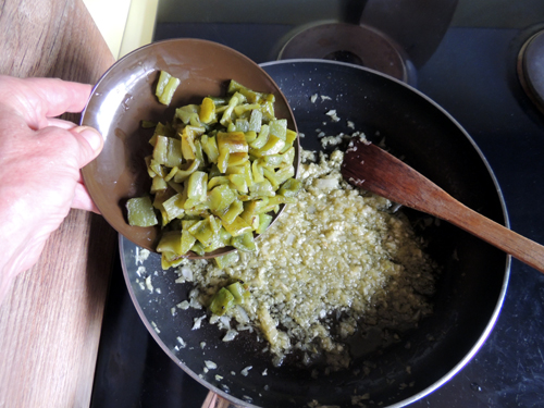add peppers to the pan
