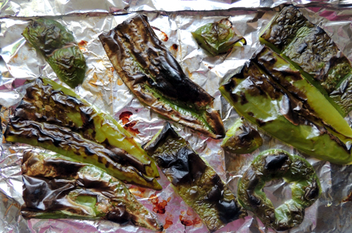 remove peppers when skins are blackened