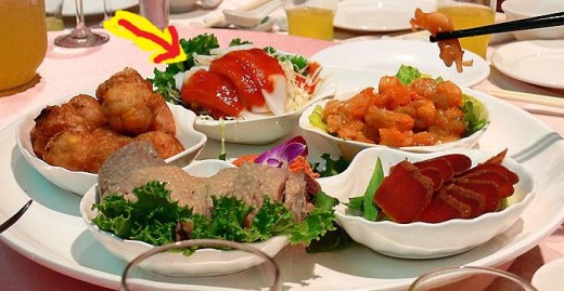 Geoduck prepared for consumption (indicated by arrow)