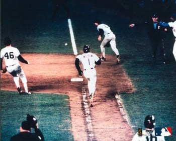 The ball gets through Bill Buckner to give the Mets the victory in Game 6 of the 1986 World Series