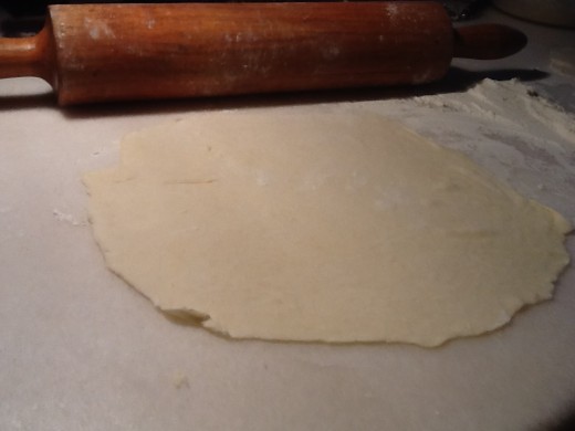 Use a rolling pin to shape the tortilla