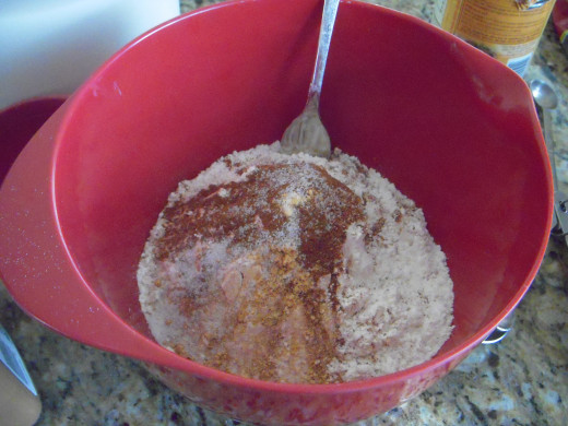 In a separate bowl, add flour, baking soda, baking powder, salt and spices.