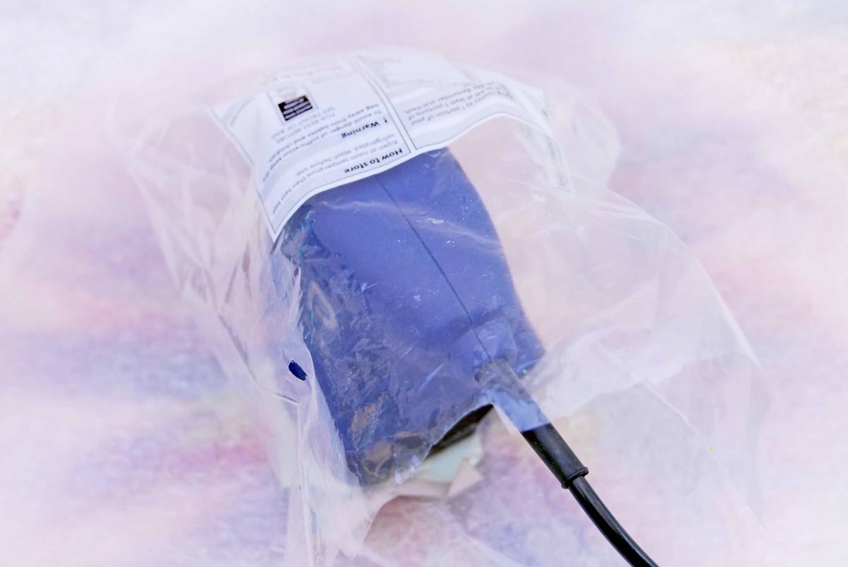 Electric Sander placed in a strong open plastic bag
