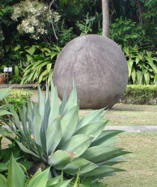 Pre-Columbian stone sphere on display on the lawn of the Museo Nacional.  The reason for these stone spheres has not been deciphered, it is one of the enigmas of the pre-Columbian people in the southwestern part of the country.