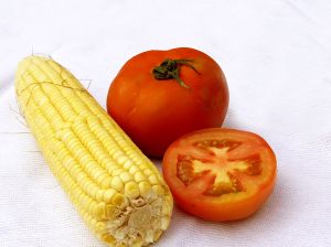 Sliced tomatoes and corn make a goiod summertime meal.