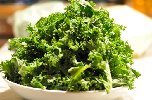 Kale leaves cut into pieces ready to be added to the pan. Image: © Siu Ling Hui
