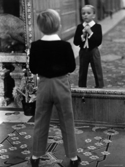 THE BOY ON THE MIRROR