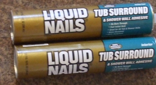 Get the Liquid Nails specific to Tub Surrounds - other types may melt the plastic -- eeuuuw!