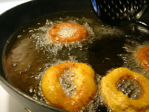 Frying doughnuts. 