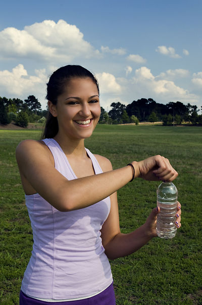 Exercising Girl Drinking Water