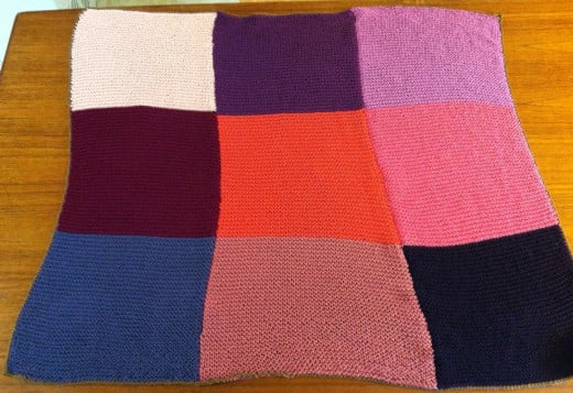 The completed blanket, with a thin single crochet border.