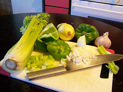 In Creole or Cajun Cooking the Holy Trinity is equal parts of Celery, Onions, And Green Bell Peppers.