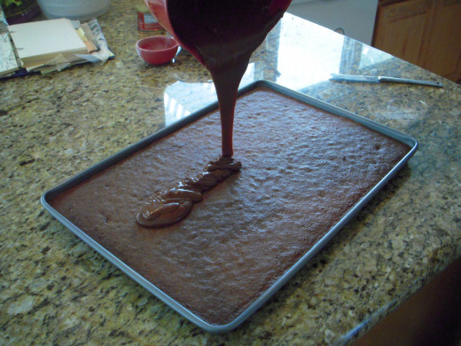 Pour icing over still-warm brownies in pan.