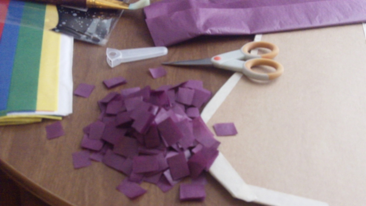 Cut cut pieces of tissue paper.  I found keeping the tissue paper folded while cutting the easiest way to do this.