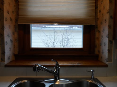 Start off with a clean window and kitchen shelf