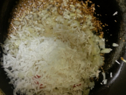 Add in onion and coconut