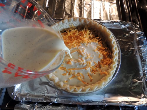 I add the custard once the pie shell is safely placed on the oven rack, to minimize spills