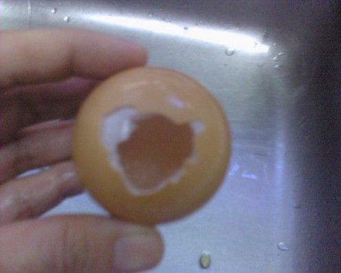 make sure the hole is sufficient for the egg yolk to slip out 