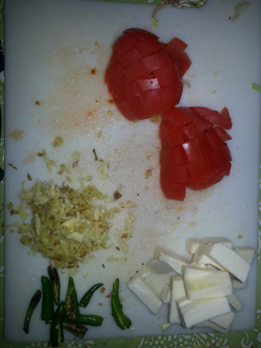 Chopped tomato, cottage cheese, sliced chilli and minced ginger and garlic
