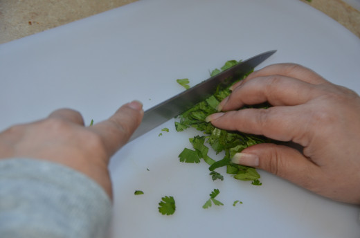Cut cilantro again at a 90 degree angle from last cut.  