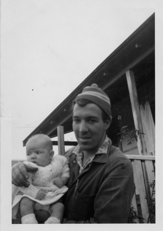 With my daughter in 1966 outside our house in a small Victorian logging village. Click for full size pictures.