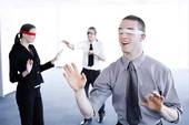 blindfolded business people - never question the ethics of those we work for