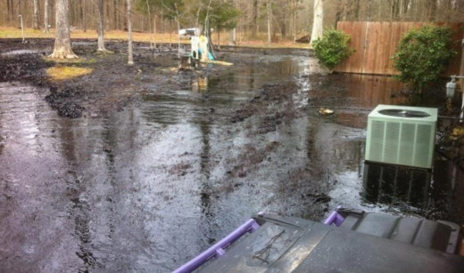 In April 2013 an ExxonMobil pipeline carrying nearly 100,000 barrels of toxic tar sands crude spewed into Mayflower, Arkansas. Yards are flooded in black crude, a river of toxic oil flows down the street, and the nearby fishing lake is covered 