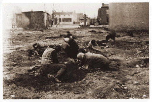 This is from Ghetto Litzmannstadt.  It is showing children looking for fuel to heat their homes.  Scavenging for fuel.