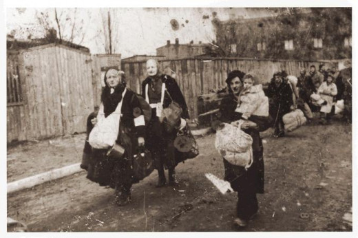People being deported, had to take whatever they could carry with them.  These are residents from Ghetto Litzmannstadt.  They are heading towards the trains that will take them to Chelmno.