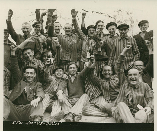 Rescued from Dachau.  They are toasting to their liberators.  This is amazing, and might be one of my favorite photos ever taken, of all time.
