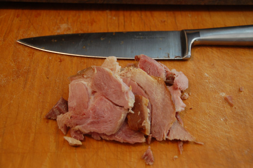 ham ready to get chopped with the chef's blade