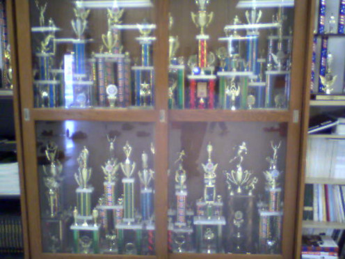 High school trophies. Some people buy their own trophies today through the mail or via the Internet, very inexpensively. 