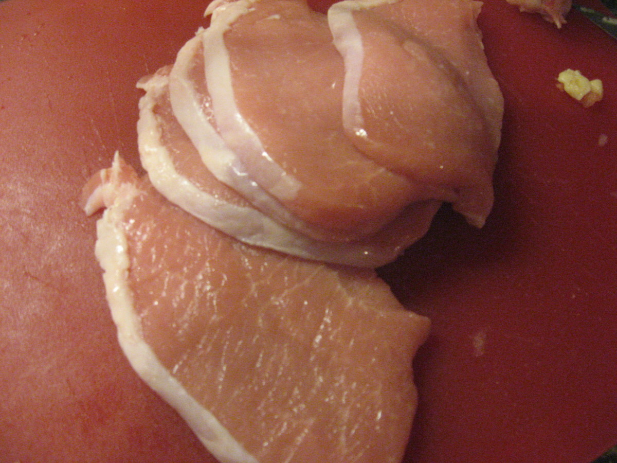 Cut pork into strips.
