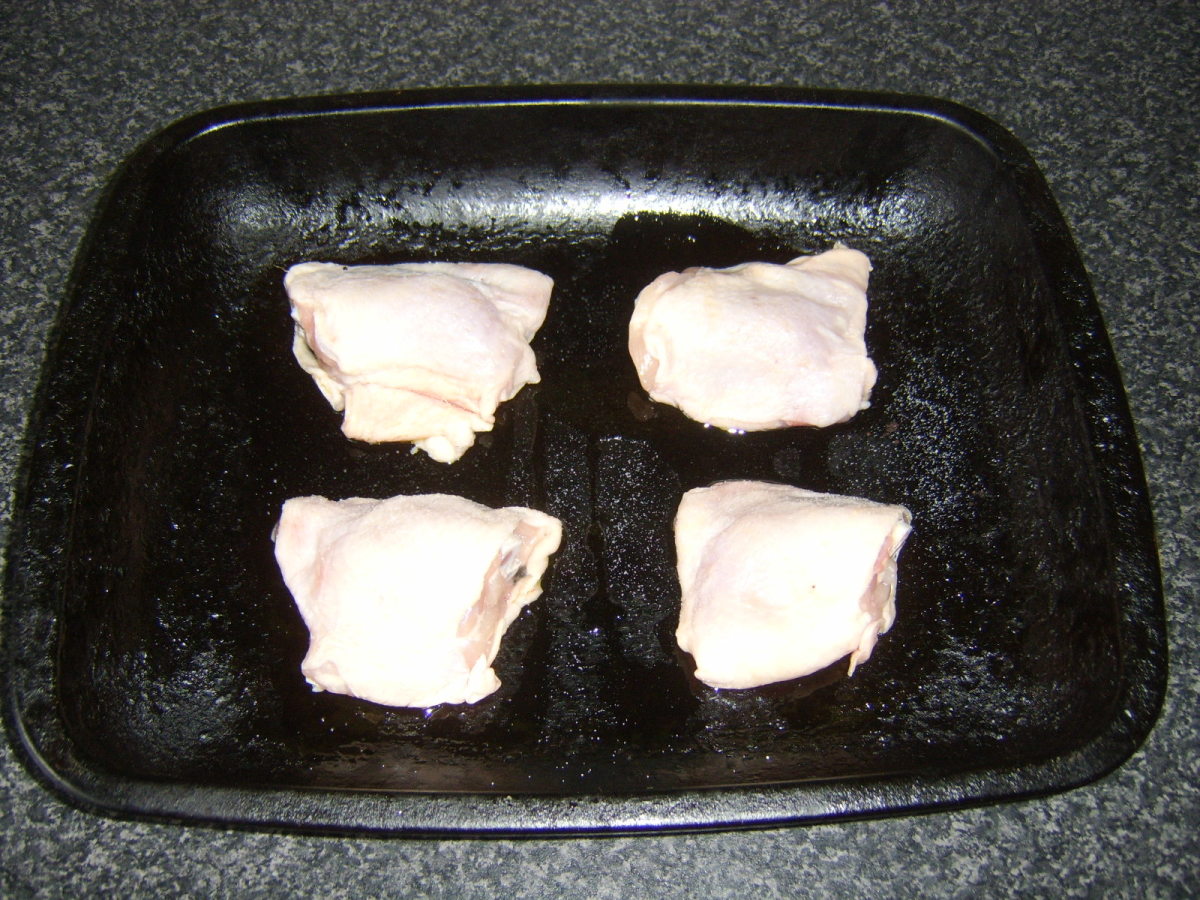 Chicken thighs ready for roasting