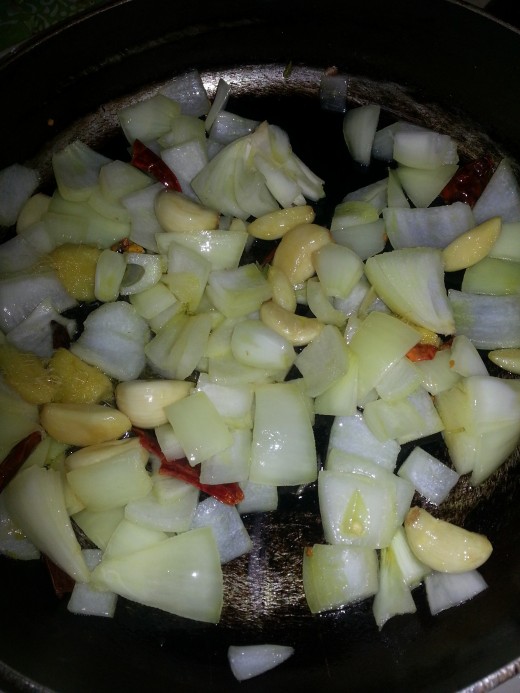 Lightly Fry ginger garlic onion and tomatoes