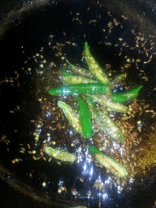 Put in few sliced green chilli if you want to make it spicy (Optional)