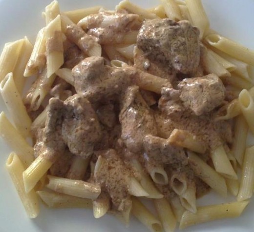 Pasta with pork in yogurt-rosemary sauce