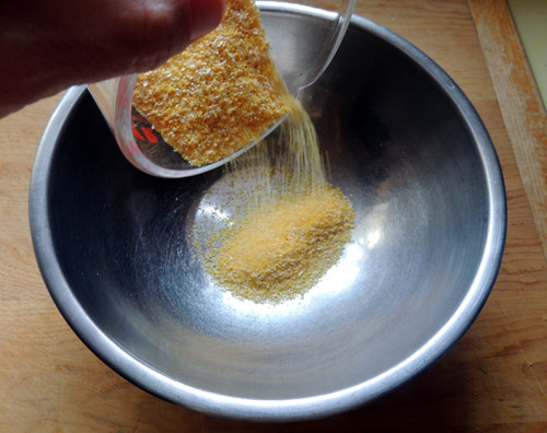 In separate bowl start the dry mix with corn meal