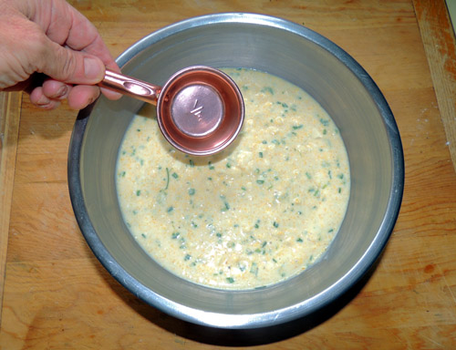 grab a ¼ cup measure to dollop batter onto skillet