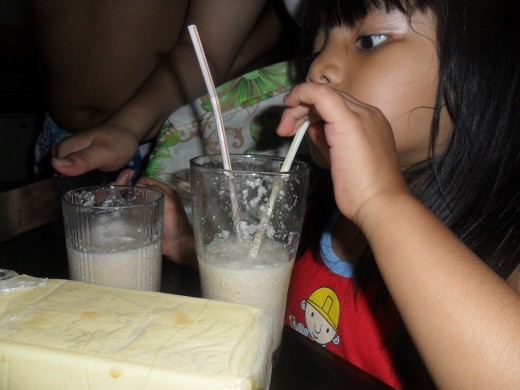 My niece enjoying her melon cheese shake. :*
