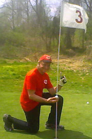 Mike "Ace" Kruse revels in his Hole-in-One at the Sugar Bay Golf Course in Warsaw, Kentucky.