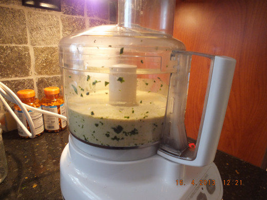 Set aside the spinach and then add the flour mixture to the food processor.