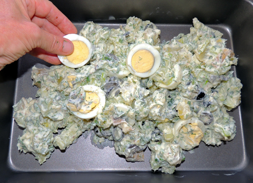 transfer to long pan to delicately place egg slices into mix