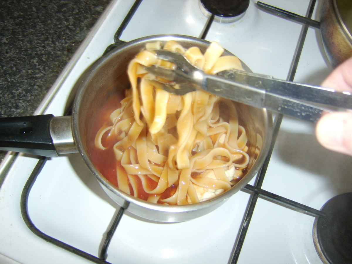 Tagliatelle is carefully coated in sweet and sour sauce