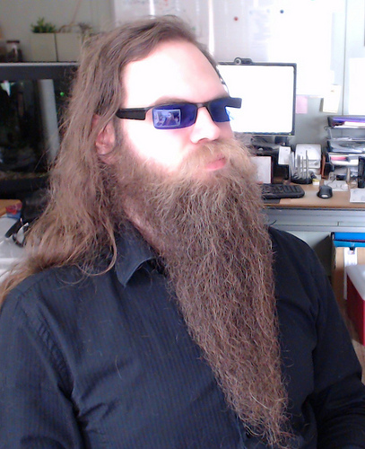 This gent is wearing a pair of Irlen Lenses, which help some people read words off of paper or computer screens more easily.