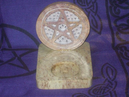 Candle or incense holder