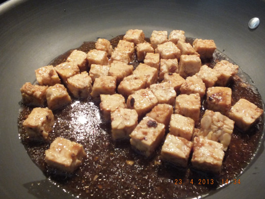 Take a small amount of the marinade and saute the tempeh until golden brown.