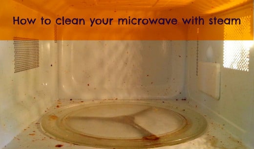 Does your microwave look like this on the inside?  Try cleaning it with steam.
